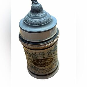 German stoneware beer stein with pewter flip lid.  Good vintage condition
